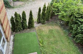 Reihenhaus kaufen in 03149 Forst, Eigentumswohnung mit Garten im Reihenhaus-Stil
