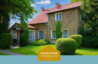 Doppelhaushälfte kaufen in 14656 Brieselang, Charmante Doppelhaushälfte aus dem Jahr 1934 mit Garagen und parkähnlichem Gartengrundstück