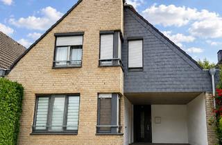 Einfamilienhaus kaufen in 50765 Esch/Auweiler, Freistehendes Einfamilienhaus mit Einliegerwohnung, Kamin und Terrasse – nahe dem Escher See