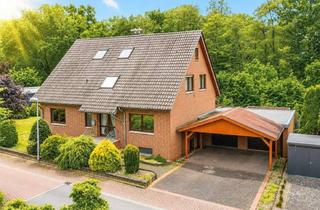 Haus kaufen in 32584 Löhne, Großzügiges Wohnhaus mit ca. 300 m² Wohnfläche in bester Lage von Löhne – Doppelgarage & Carport