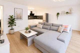 Wohnung kaufen in 76689 Karlsdorf-Neuthard, Neuwertige 2-Zimmer-Wohnung im Erdgeschoss mit Balkon und Stellplatz in ruhiger Wohnlage