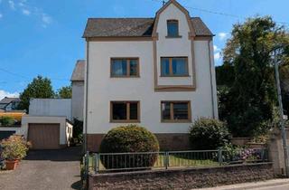 Einfamilienhaus kaufen in 56218 Mülheim-Kärlich, Mülheim-Kärlich - Einfamilienhaus mit Garten und Garage zu einem attraktiven Preis