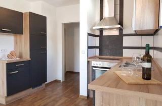 Wohnung kaufen in 31812 Bad Pyrmont, Bad Pyrmont - Gemütliche 2,5-Zimmer-Wohnung mit zwei Balkonen in ruhiger Lage -