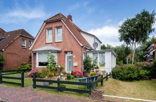 Haus kaufen in Jakob-Pauls-Weg 18, 26465 Langeoog, Charmantes Inselhaus mit zwei Wohneinheiten und sonniger Terrasse auf Langeoog