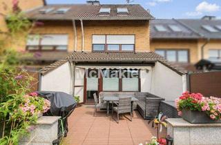 Reihenhaus kaufen in 46119 Oberhausen, Familienfreundliches Reihenhaus mit sonniger Terrasse und schönem Garten
