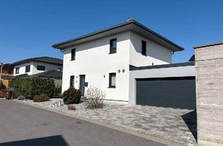 Einfamilienhaus kaufen in 97294 Unterpleichfeld, Unterpleichfeld - Modern wohnen mit der Natur vor der Tür