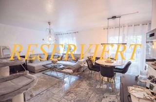 Wohnung kaufen in 65428 Rüsselsheim, Erdgeschosswohnung mit Garten und moderner Ausstattung