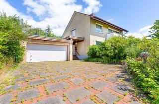 Haus kaufen in 23730 Neustadt, Solider 60er-Jahre-Klassiker mit großem Garten in begehrter Lage
