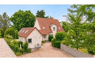 Haus kaufen in 67378 Zeiskam, Exklusives Wohnanwesen mit parkähnlichem Grundstück in begehrter Feldrandlage!