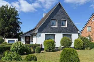 Einfamilienhaus kaufen in 25436 Uetersen, Familienfreundliches Einfamilienhaus mit gepflegtem Garten und Garage
