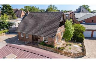 Einfamilienhaus kaufen in 25774 Lunden, Solides Einfamilienhaus mit großem Potential in Lunden