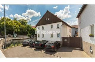 Haus kaufen in 35428 Langgöns, Solide Basis für Ihre Wohnträume: Weitläufiges Haus in attraktiver Ortsmitte