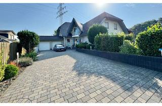 Einfamilienhaus kaufen in 38518 Gifhorn, Exklusives Einfamilienhaus mit Einliegerwohnung in Form einer Doppelhaushälfte