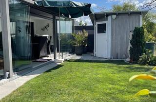 Wohnung kaufen in 74670 Forchtenberg, Exklusive Gartengeschosswohnung in unverbaubarer Aussicht & Wintergarten