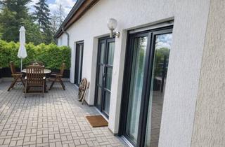 Wohnung kaufen in 14789 Wusterwitz, Moderne 3-Zimmer-Wohnung in Wusterwitz, Bungalowcharakter mit Garten + vermietete Gewerbeeinheit