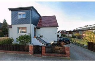 Haus kaufen in 38554 Weyhausen, Weyhausen - Großzügiges wohnbares Zweifamilienhaus mit zusätzlichem Bauplatz