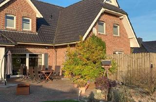 Einfamilienhaus kaufen in 26219 Bösel, Bösel - Einfamilienhaus mit Einliegerwohnung zentral in Bösel
