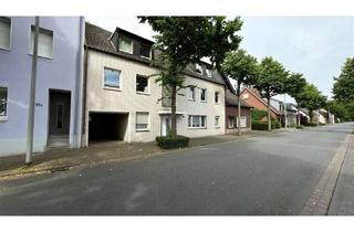 Mehrfamilienhaus kaufen in 46537 Dinslaken, Dinslaken - Mehrfamilienhaus mit Potenzial in Dinslaken-Bruch - 5 Wohneinheiten, Garten & Garagen