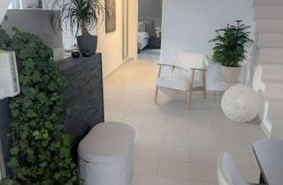 Wohnung kaufen in 71154 Nufringen, Moderne 3,5 Zimmer Maisonette-Wohnung mit Stellplatz und Carport