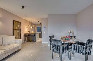 Wohnung kaufen in 47918 Tönisvorst, Stilvolle 5-Zimmer Maisonettewohnung mit Garten und Stellplatz