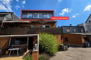 Wohnung kaufen in 46149 Schwarze Heide, Charmante Dachgeschosswohnung mit Empore in begehrter Lage von Oberhausen-Holten (Biefang)