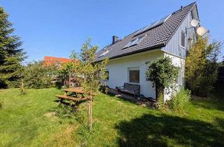 Wohnung kaufen in 27404 Zeven, Dachgeschosswohnung mit Doppelcarport