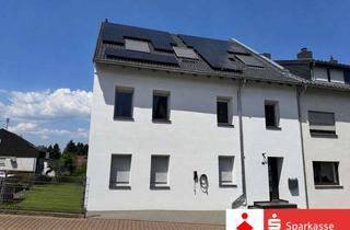 Wohnung kaufen in 66292 Riegelsberg, Hochwertige Eigentumswohnung im Maisonette-Stil mit eigenem Garten