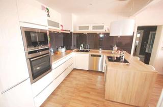 Wohnung kaufen in 38179 Schwülper, Großzügige 4,5-Zimmer-Erdgeschosswohnung mit Gartenanteil in ruhiger Lage von Walle