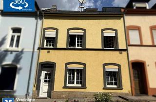 Haus kaufen in 54516 Wittlich, Vermietetes Stadthaus mit zwei Wohnungen und Stellplätzen