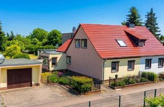 Haus kaufen in Fuhneweg, 06780 Zörbig, Ihr neues Zuhause in Zörbig: Großes Grundstück, moderne Heizung 2023, gemütliche Terrasse und Garage