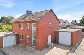 Haus kaufen in 50181 Bedburg, Zwei Wohneinheiten, großzügiges Grundstück und Garagen im XXL-Format in Bedburg-Kaster