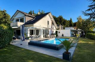 Einfamilienhaus kaufen in 61479 Glashütten, Wohnen wie im Urlaub: Privates Einfamilienhaus mit Pool, Sauna und Outdoor-Küche am Waldrand!