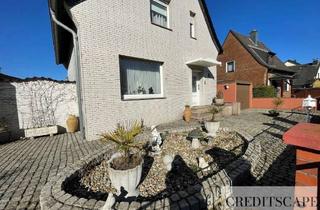 Einfamilienhaus kaufen in 45476 Styrum, Freistehendes Einfamilienhaus mit zwei Garagen und großem Garten