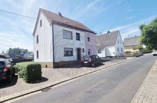 Einfamilienhaus kaufen in 56459 Guckheim, Gemeinde Guckheim: Einfamilienhaus mit Garten und Garagen
