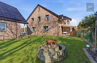 Haus kaufen in 25693 St. Michaelisdonn, Lebensqualität: Großzügig & modern mit Blick ins Grüne!