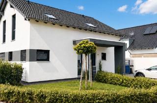 Haus kaufen in 53567 Asbach, Freistehendes KfW-40-Familienhaus mit Wärmepumpe und großem Garten