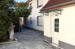 Haus kaufen in 69207 Sandhausen, Bezugsfreies Zweifamilienhaus mit viel Potenzial – Eigennutzung oder Kapitalanlage in Sandhausen