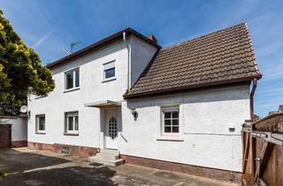 Einfamilienhaus kaufen in 65468 Trebur, Einfamilienhaus mit Garten, Garage und Nebengebäude zentral in Trebur