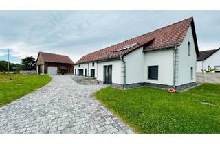 Einfamilienhaus kaufen in 15890 Eisenhüttenstadt, Eisenhüttenstadt - Frisch saniert mit Werkstattscheune und Doppelgarage in Vogelsang