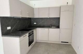 Wohnung mieten in Am Stadtwall 14, 84453 Mühldorf, Helle 2-Zimmer-Wohnung mit Gartenanteil