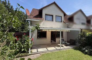 Haus kaufen in 30159 Mitte, Stadtnah wohnen - Im grünen leben - Charmantes Reihenendhaus mit Garten, Stellplatz und Garage
