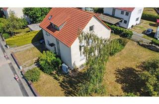 Haus kaufen in 91616 Neusitz, Neusitz - Attraktives Dreifamilienhaus mit großem Garten, Doppelgarage und moderner Wärmepumpe