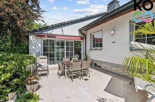 Haus kaufen in 42489 Wülfrath, Reihenendhaus mit besonderer Architektur und Gartenparadies
