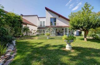 Haus kaufen in 85521 Ottobrunn, Exklusives Reihenendhaus mit parkähnlichem Grundstück, in Bestlage von Ottobrunn