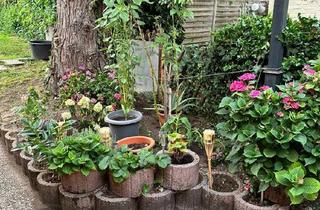 Reihenhaus kaufen in 40699 Erkrath, Renovierungsbedürftiges Reihenhaus mit großem Garten und viel Potenzial in Erkrath-Hochdahl