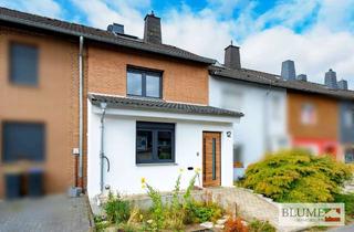 Haus kaufen in 45731 Waltrop, Beliebte Lage in Waltrop: Modernisiertes Reihenmittelhaus mit zwei Garagen!