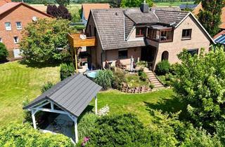 Haus kaufen in 31559 Hohnhorst, Großzügiges Zweifamilienhaus in idyllischer Feldrandlage-Wohnen mit viel Platz und Möglichkeiten