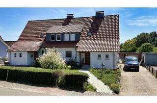 Doppelhaushälfte kaufen in 31840 Hessisch Oldendorf, Charmante Doppelhaushälfte mit großem Grundstück und vielseitigen Nutzungsmöglichkeiten