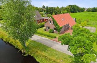 Einfamilienhaus kaufen in 26639 Wiesmoor, Gepflegtes Einfamilienhaus mit Scheune auf sehr großem Grundstück in idyllischer Lage
