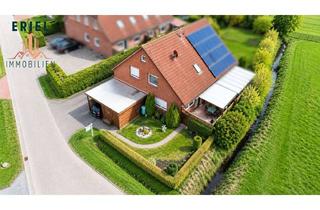 Haus kaufen in 26624 Südbrookmerland, Kapitalanlage mit Potenzial: vermietete DHH mit Garten, Carport und Wertsteigerungschance zu verkauf
